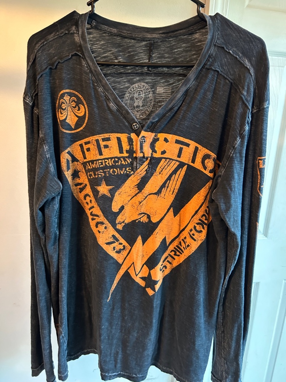 Affliction Black Long-Sleeve Graphic Henley with Orange Emblem